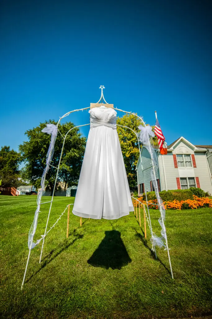 Wedding dress hanging outside before the ceremony