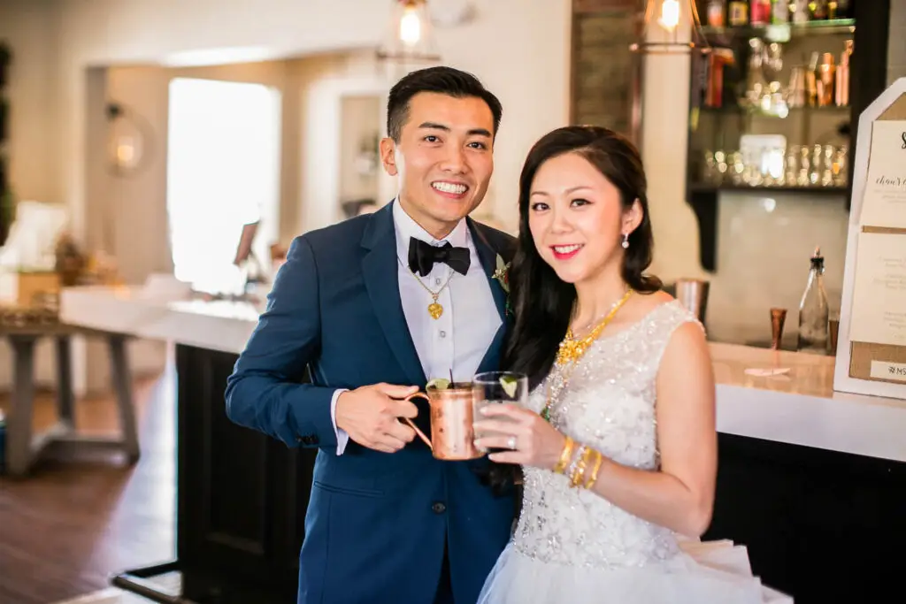 Bride and groom sharing a heartfelt wedding toast