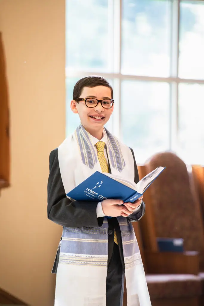 Proud Bar Mitzvah boy at his synagogue