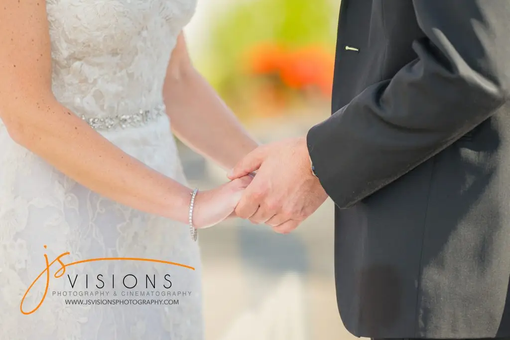 Bride and groom close-up hand shot