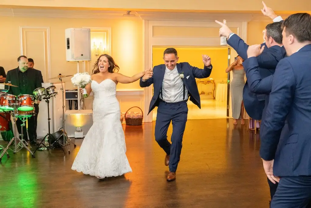 Newlyweds’ grand entrance at Soundview wedding venue