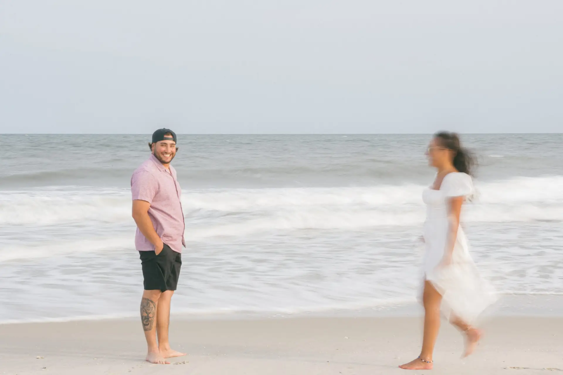 Bride's veil flowing at Robert Moses Beach Long Island