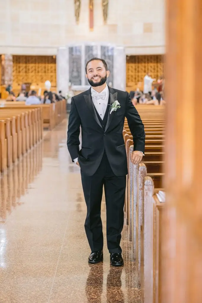 Groom anticipation moment at wedding ceremony