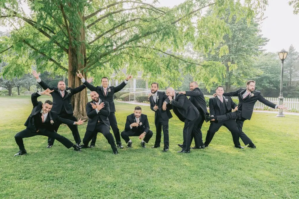 Fun groom and groomsmen wedding day photo