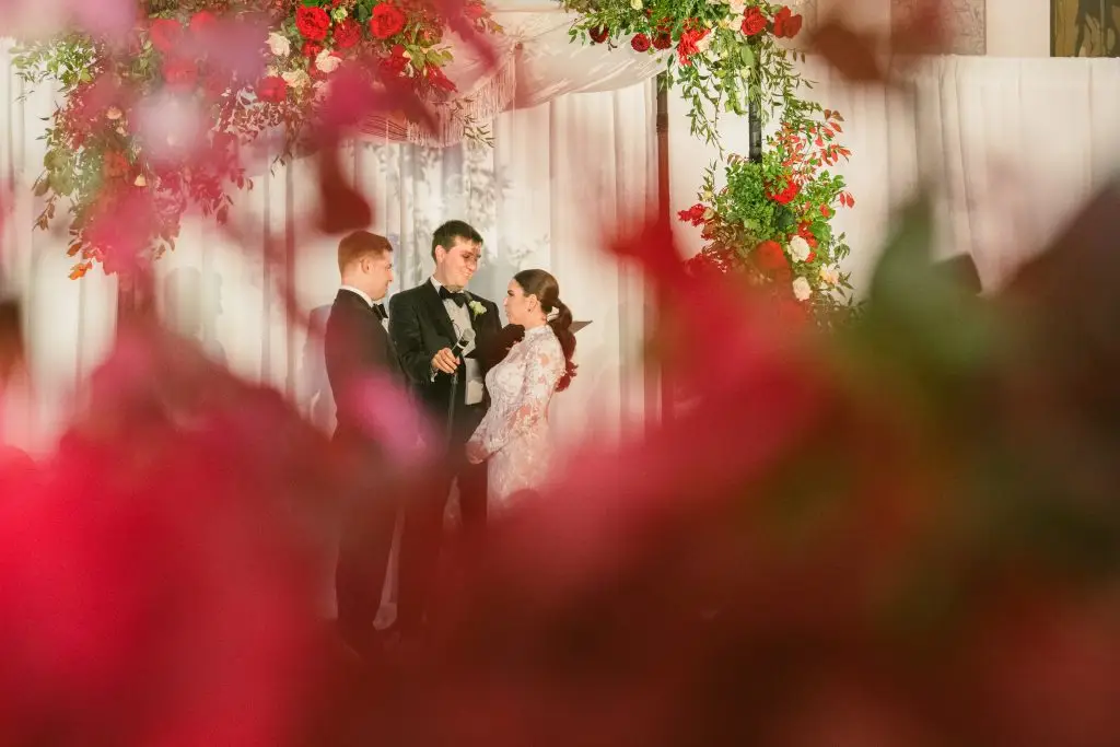 Bride and groom during ceremony at 48th Wall Street
