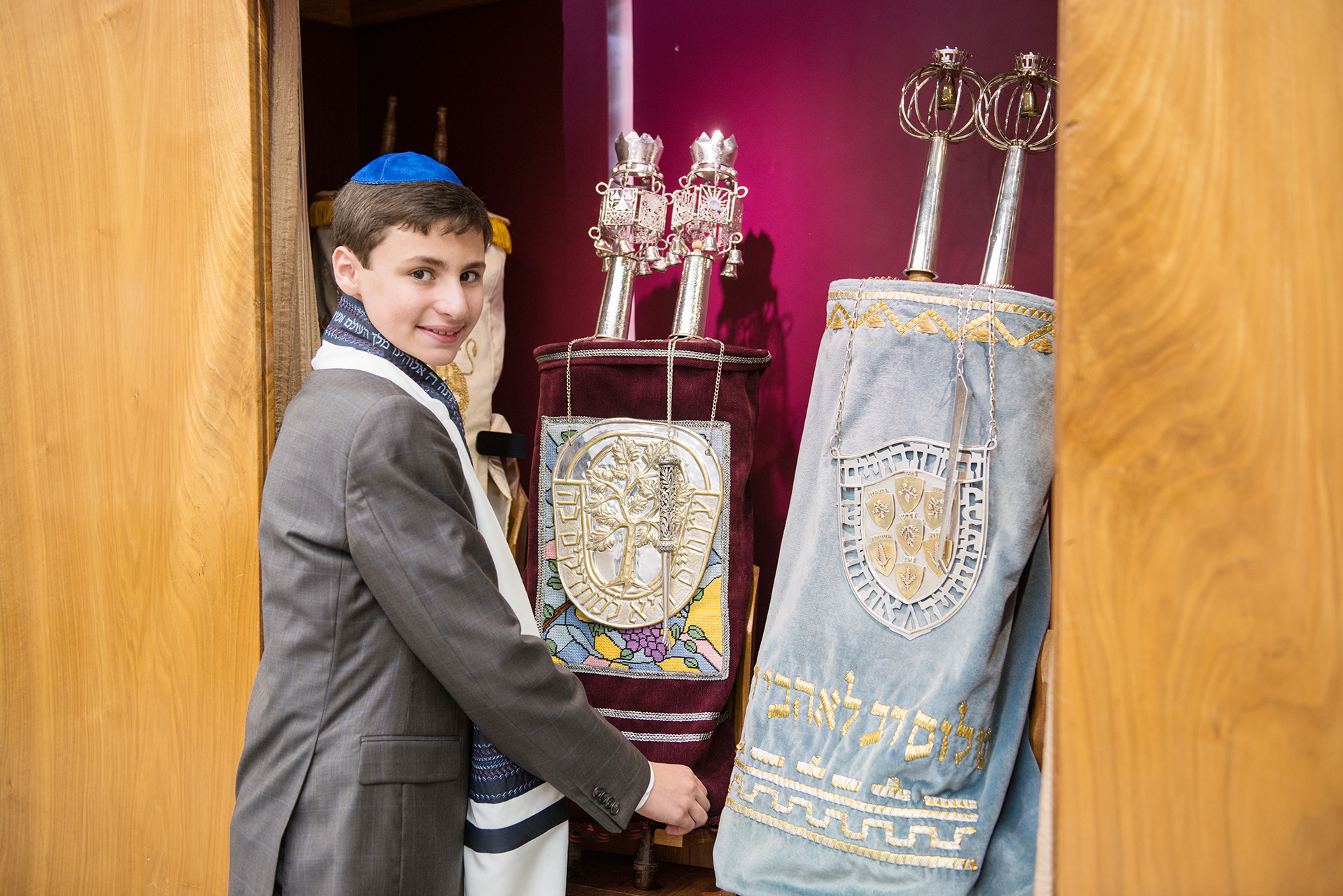 Bar mitzvah Torah portrait at synagogue — professional mitzvah photography by JSVisions