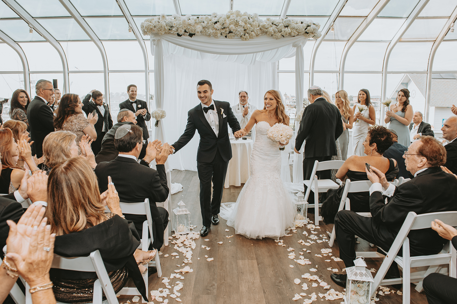 Wedding photographer and event planner collaboration - bride and groom ceremony exit on Long Island