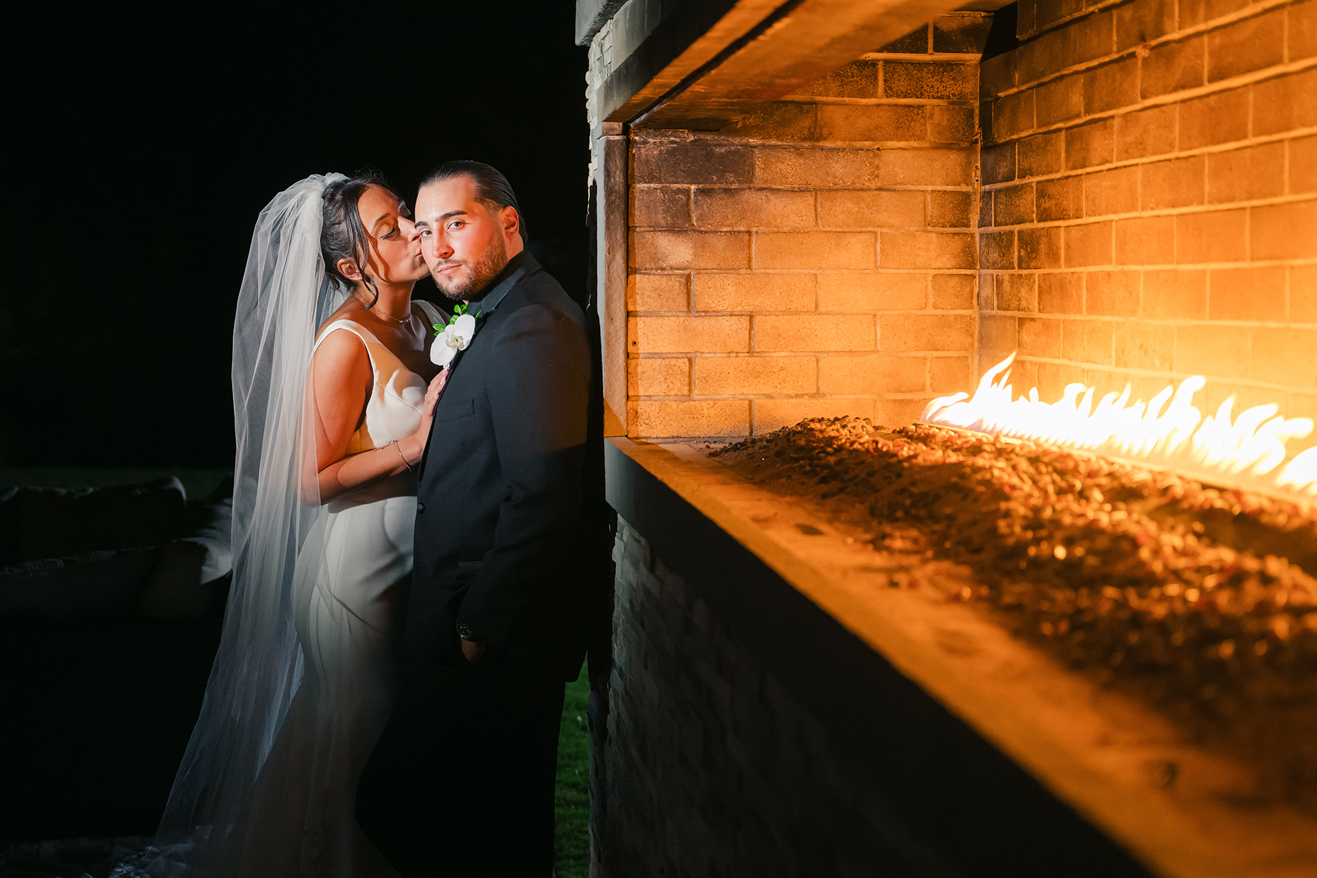 Elegant wedding portrait by fireplace at Flowerfield Celebrations Huntington