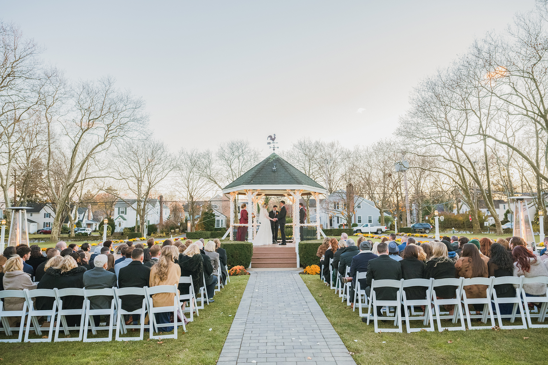 Outdoor wedding ceremony at Stewart Manor Country Club in Garden City NY