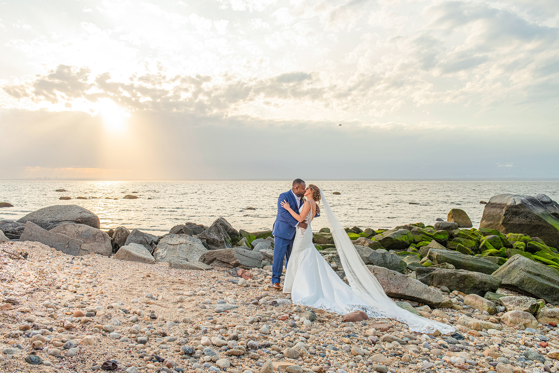 Romantic sunset beach wedding portrait at Soundview Caterers