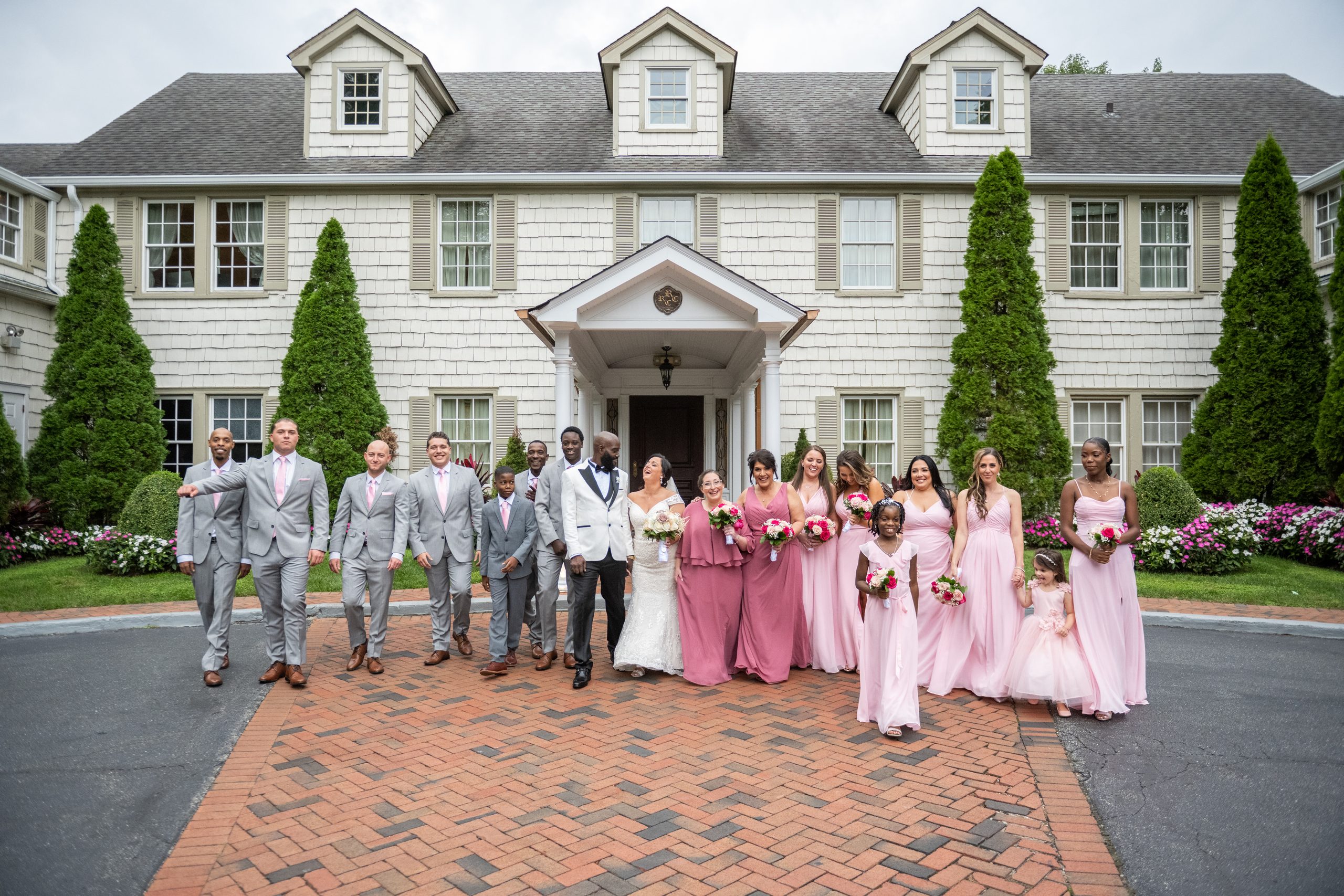 Bridal party in front of the entrance of The Royalton Mansion, Long Island