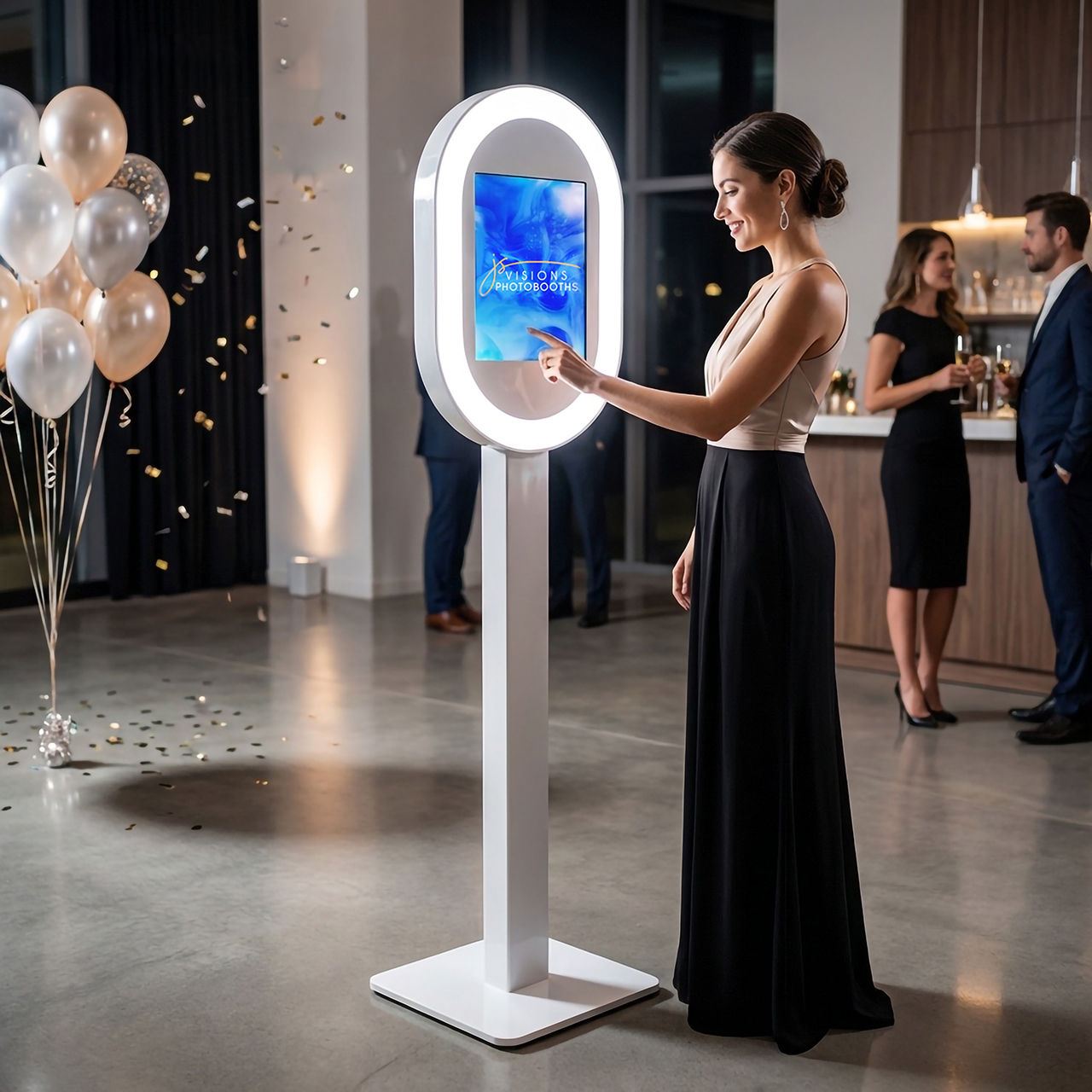 The JS Visions open-air glam photo booth — a sleek oval ring-light booth on a white stand
