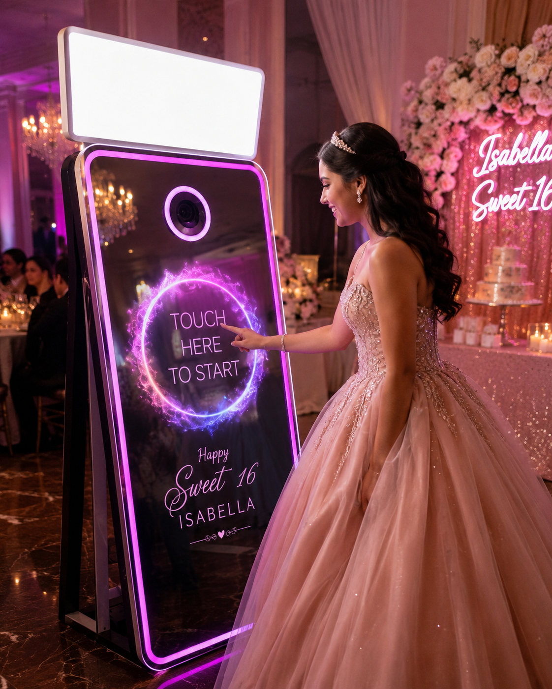Guest of honor in a blush gown touching the mirror photo booth screen at a Long Island sweet sixteen